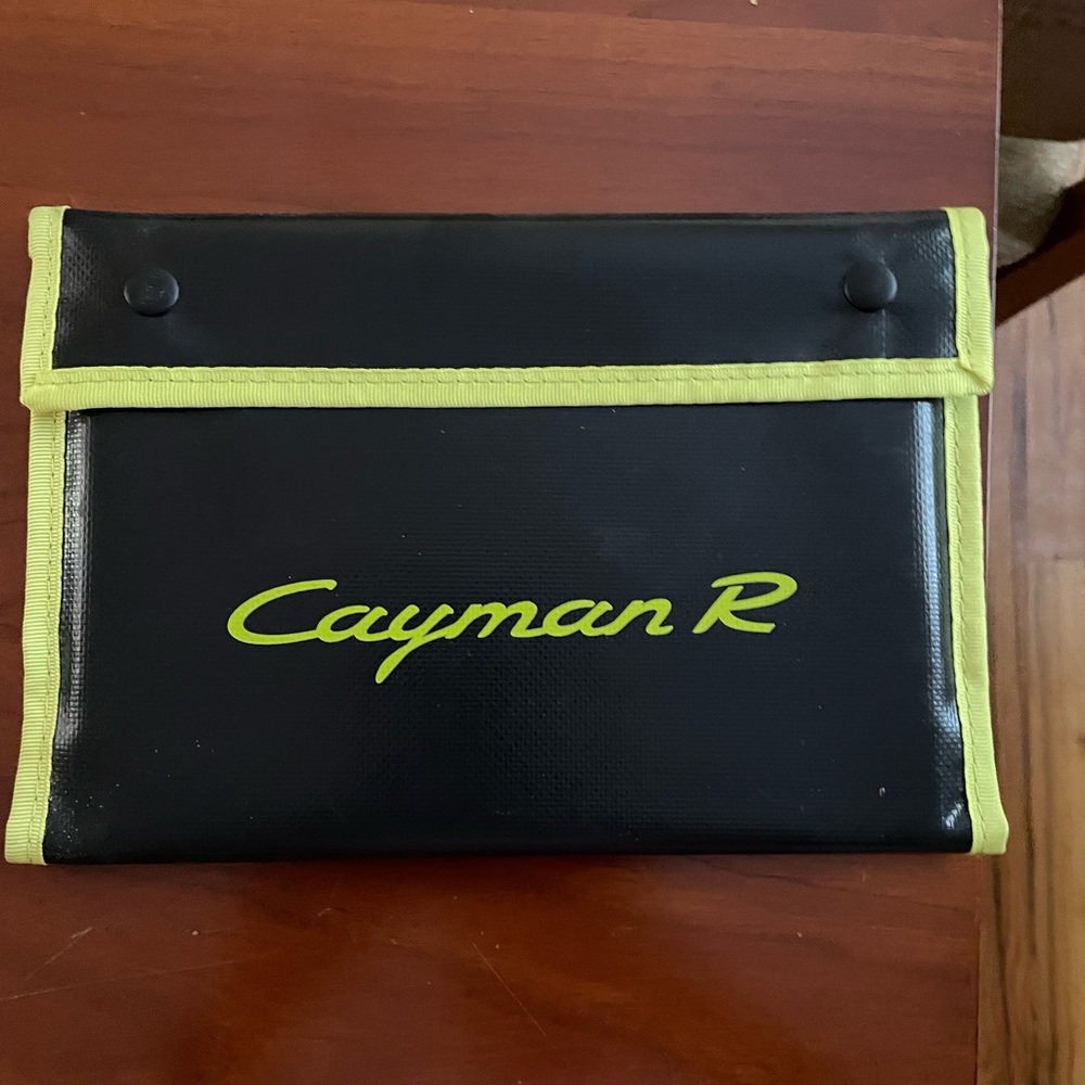 Porsche Cayman R: Radically Porsche 2011 Brochure/ Catalog with Pouch.